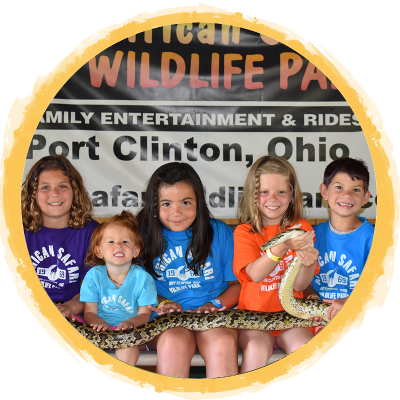 kids holding snake
